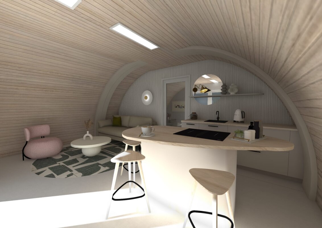 Wnętrze Tunnel House: salon, sofa, kuchnia z wyspą, łuki.