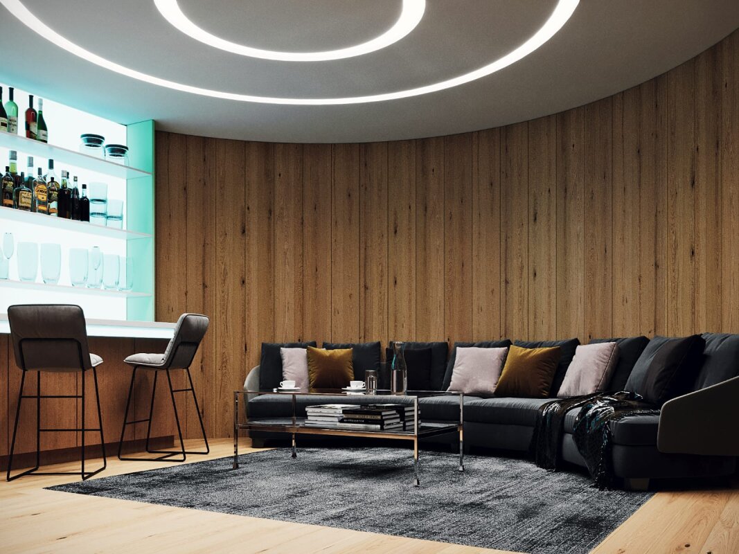 Podziemne centrum relaksu: bar, sofa, nastrojowe oświetlenie.