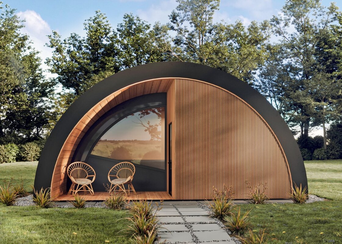 Wellness Arc Sauna: glass window, chairs, garden.